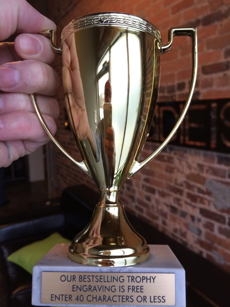 A trophy with a humorous engraving